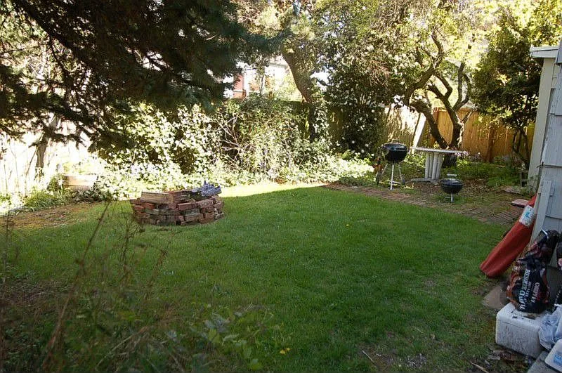 Fenced rear yard belongs to unit #1.