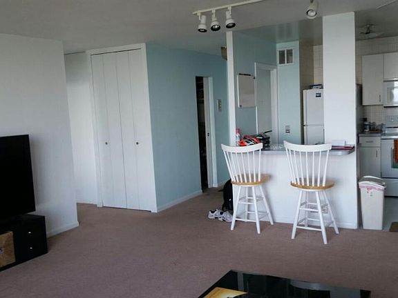 living room/kitchen/breakfast-bar open concept