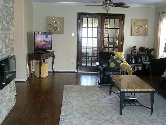 WATCH A MOVIE OR RELAX BY THE FIREPLACE...NOTICE THE FRENCH DOORS