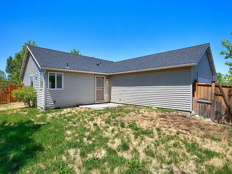 Fenced, Landscaped backyard