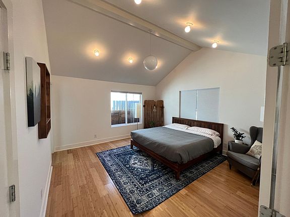Primary Bedroom with Vaulted Ceiling