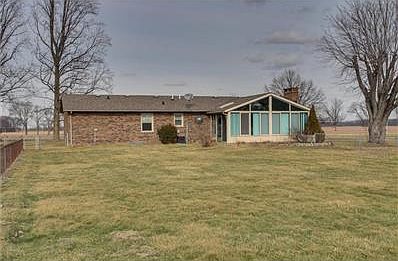 Completely fenced back yard and full view south facing sunroom!