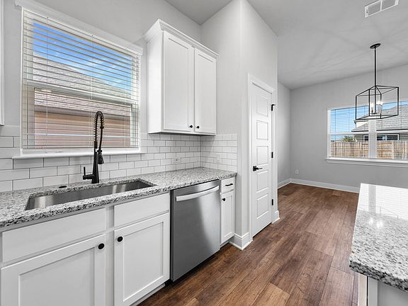 Stainless steel appliances are included