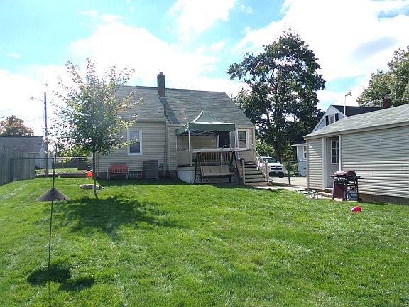 Large backyard with deck.