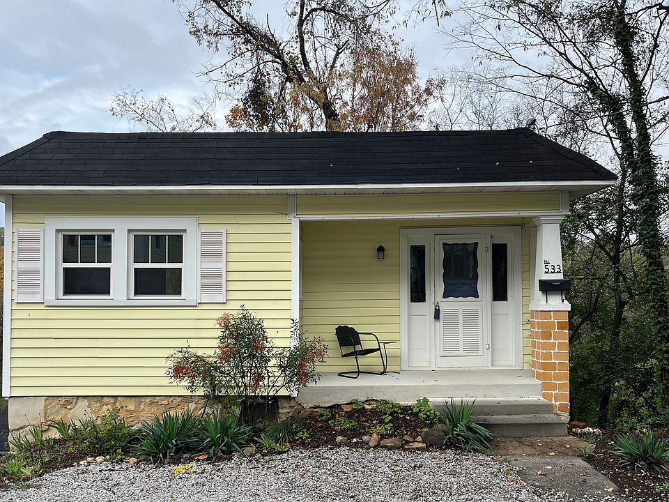 The house is on Moonhollow Lane - enjoy morning coffee on the covered front porch.