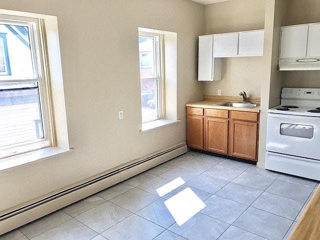 Large Kitchen with new tile
