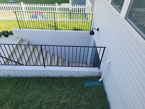 Exterior stairs leading to basement