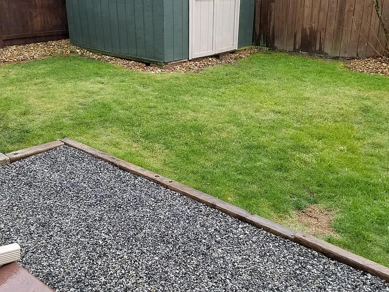 Parking area and storage shed