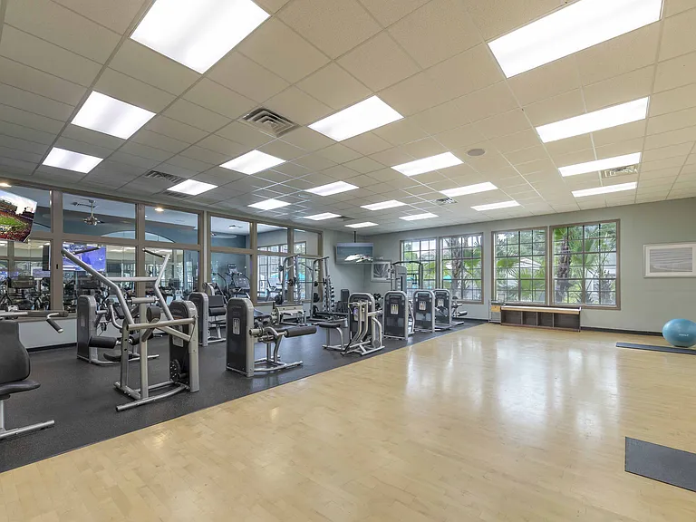 24-hour fitness center with strength and cardio equipment