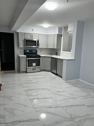 1st image of 1571 E 56th St #1