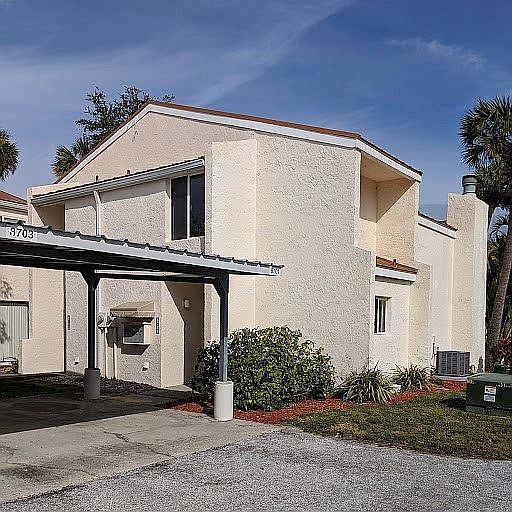 Front entrance with carport