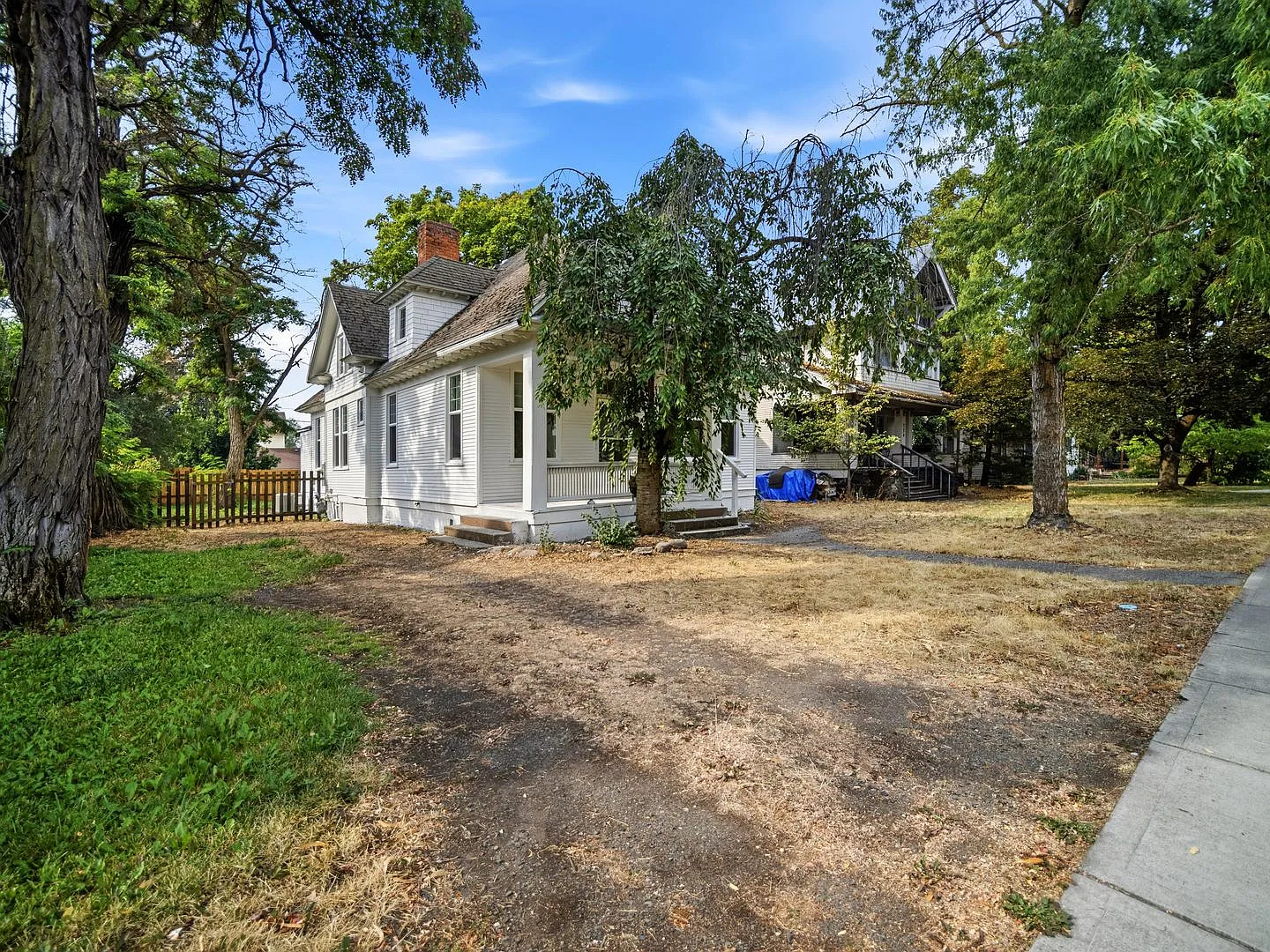 Charming 5-Bedroom Home with Fenced Yard in Spokane — Photo 4