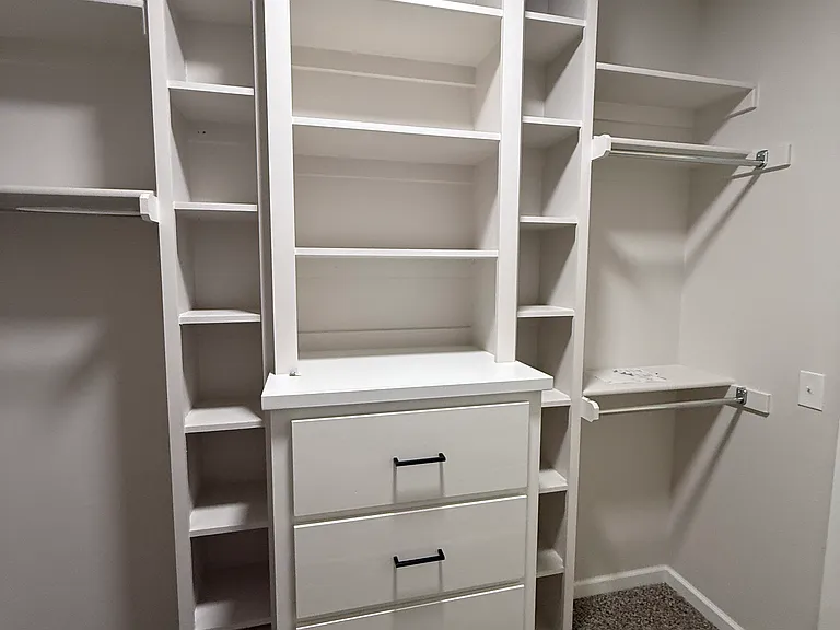 Primary Bedroom Walk in Closet