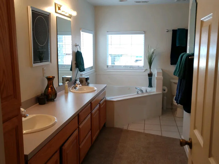 Master bathroom on second floor with two sinks, large jetted tub. Beautiful views of Mount Ben Lomonde and mountains!