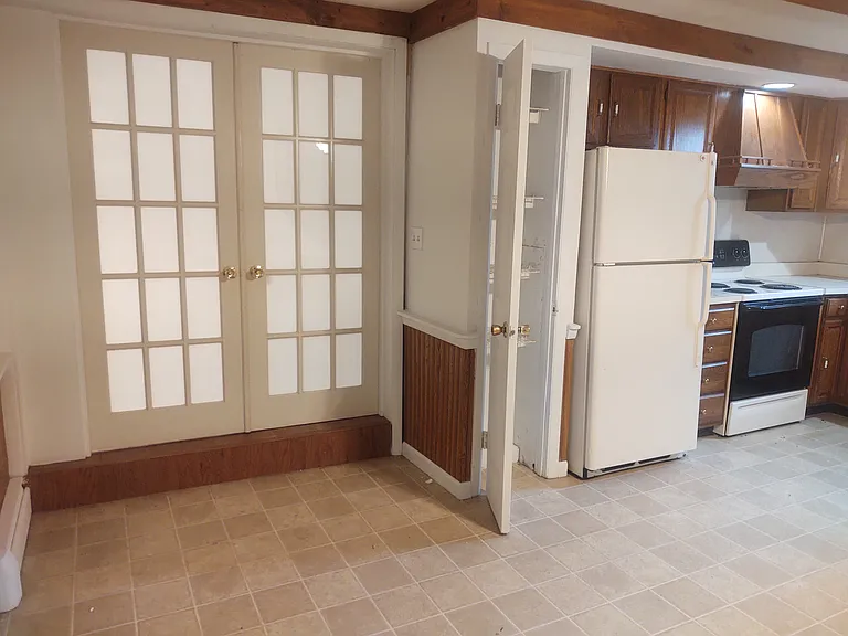 Double doors leading to formal dining room