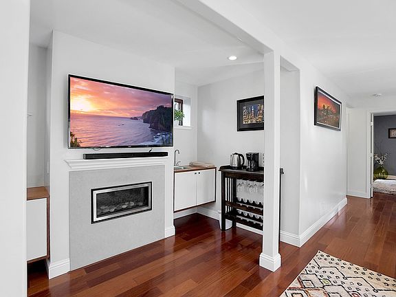 Large screen TV and gas fireplace in Living Room