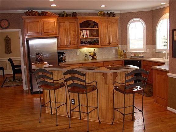 Huge Gourmet Kitchen with Stained Cabinets, Double Ovens, Desk, More