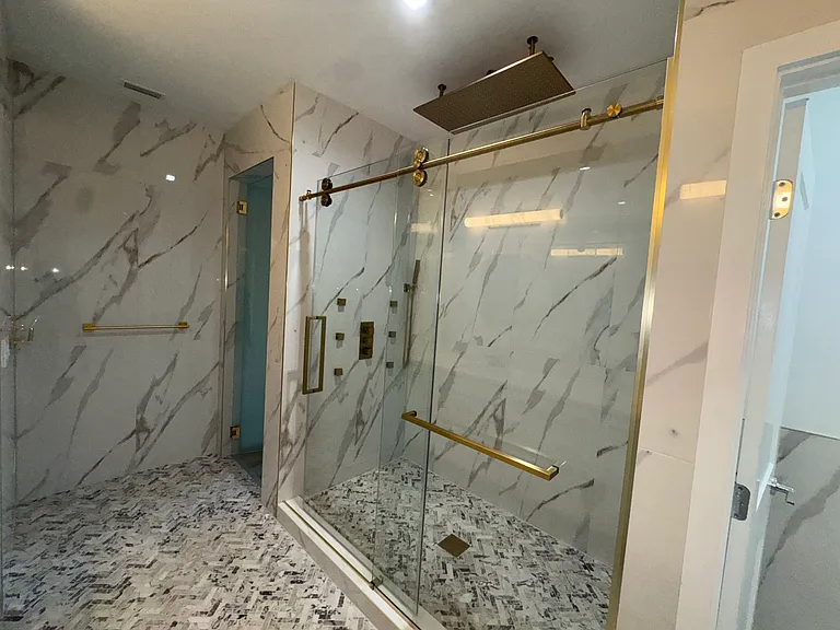 custom walk in shower with rain fall