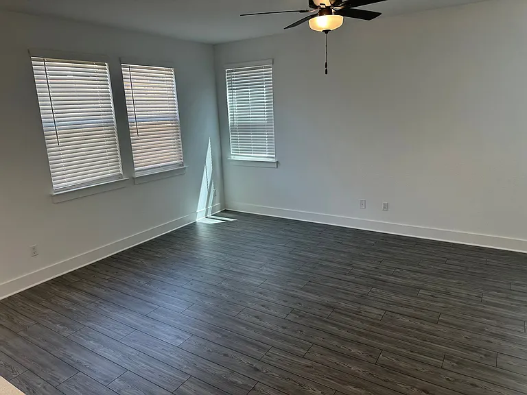 Living area with hard tile flooring