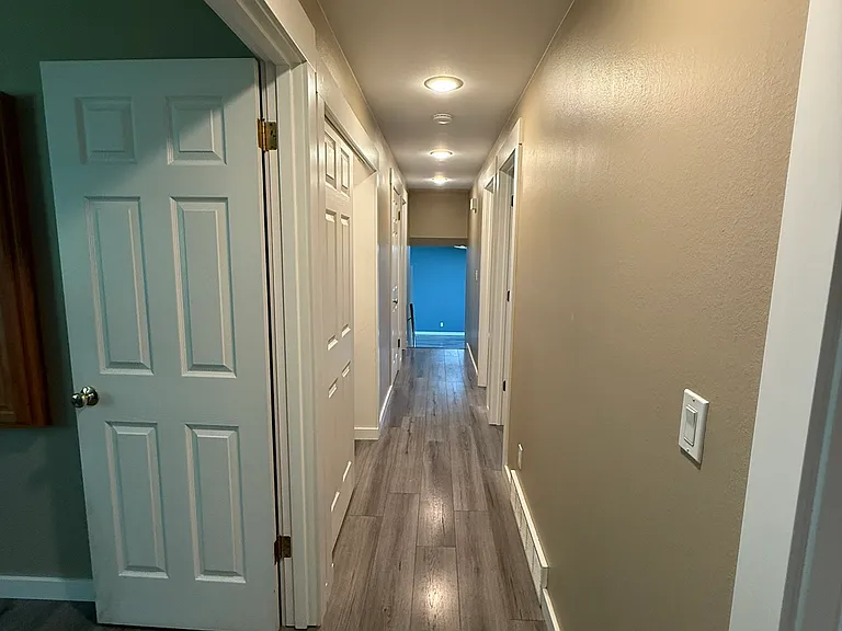 This is the end of the upper level hallway, looking back towards the main floor.