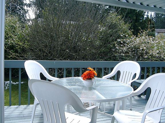 Covered patio with fruit trees
