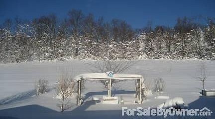 Dining Room
						:
						Doorway from kitchen to dining room & foyer