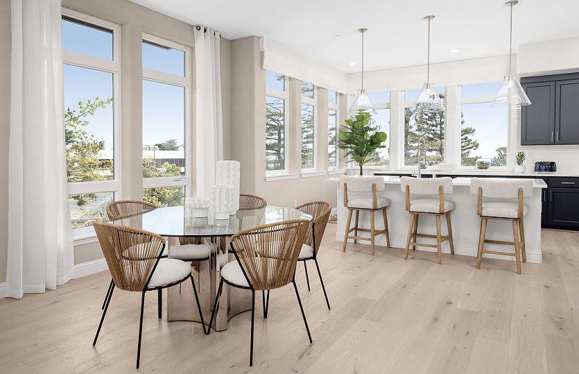 Stunning kitchen with large windows and natural sunlight