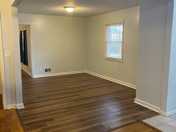 View from front door looking into living room. Kitchen is to the right of this image.