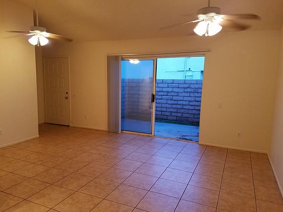 livingroom, front door entrance and outside patio.