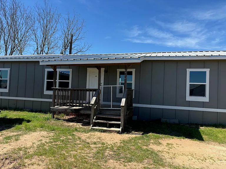 414 FM 969 — Photo 1