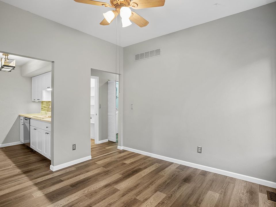 Dining room; all new flooring and baseboards throughout the unit