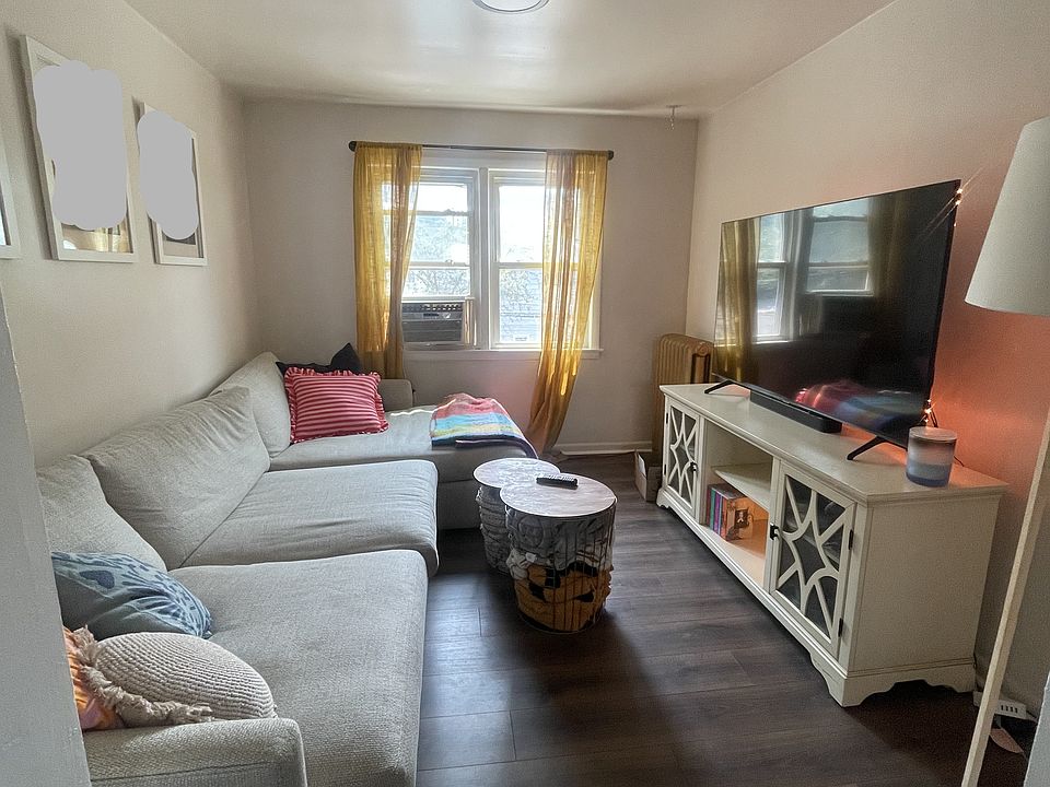 This is another perspective of the living room, highlighting its layout and character