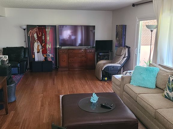 Family room with 65in Smart TV