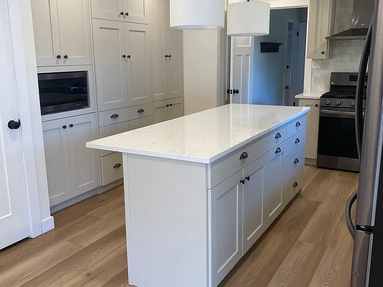 Gorgeous, updated kitchen. Tons of cabinets. Built in microwave. Fridge included.