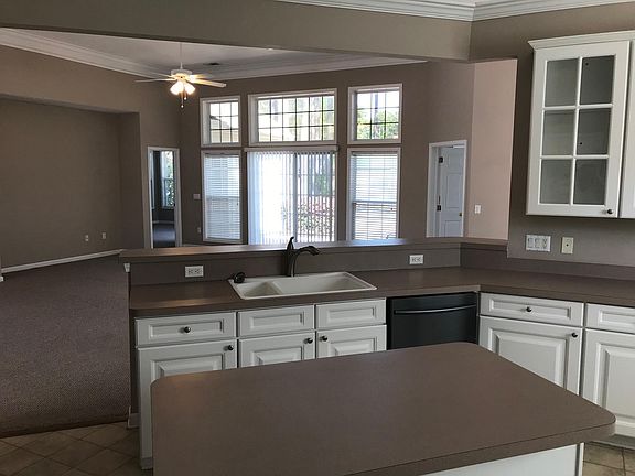 Kitchen view out to living & patio