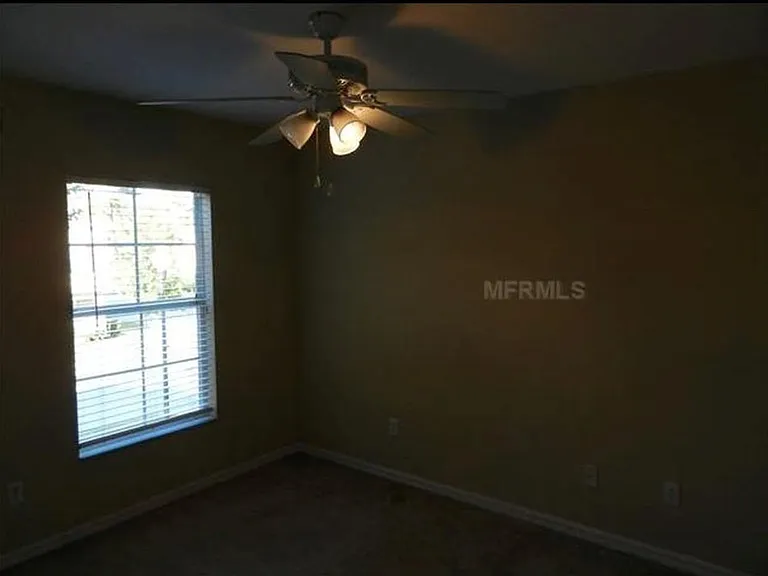 3rd bedroom w old flooring