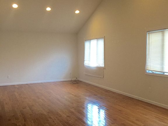 Living Room w/ Cathedral Ceilings