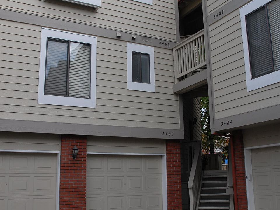 Entry stairs to 2nd floor end unit.