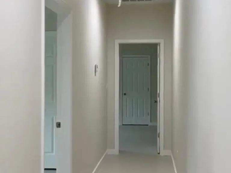 Hallway to Bedrooms & Attic Access