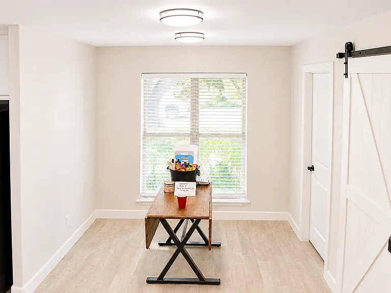 Dining room seats 6 to 8 easily, large walk in pantry (rear door), barn door - laundry. W/D not incl.