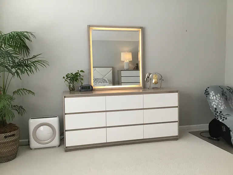 Master bedroom with vanity, and bench
