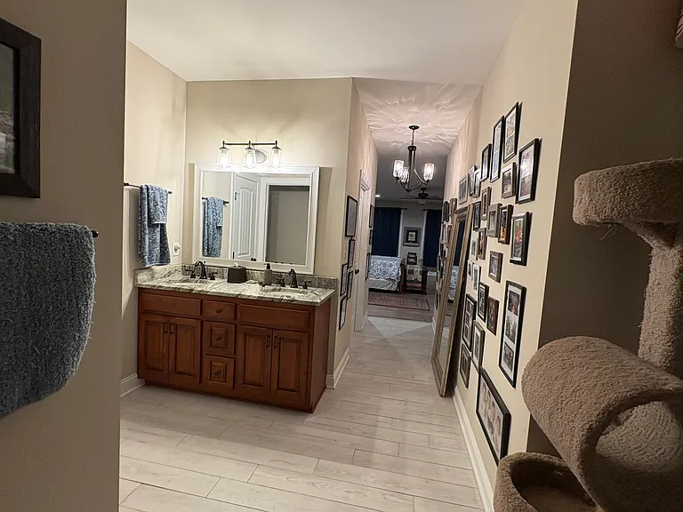 This is the hallway of the master bath looking back at the bedroom.