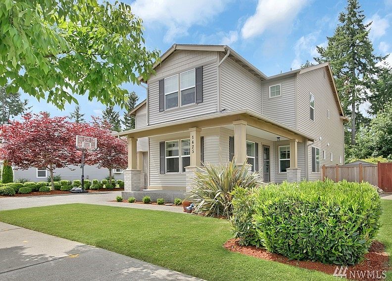 Appreciated the nicely landscaped front yard and wrap around porch