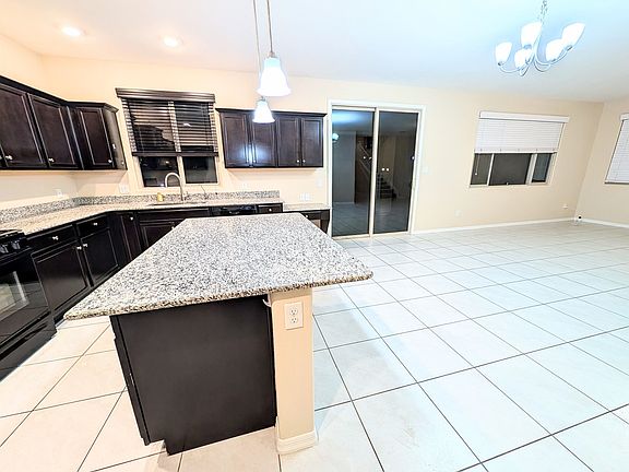 4th image of 6549 E 35th Pl
