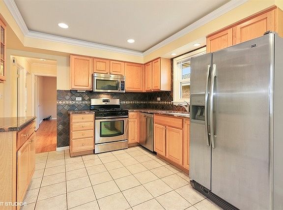 4th image of 8224 W Agatite Ave