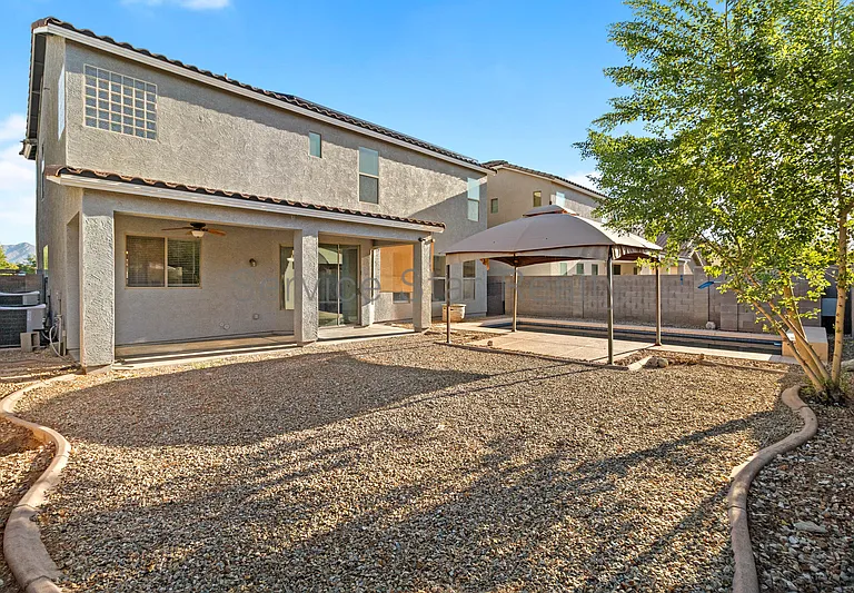 10122 W Albeniz Pl — Photo 31