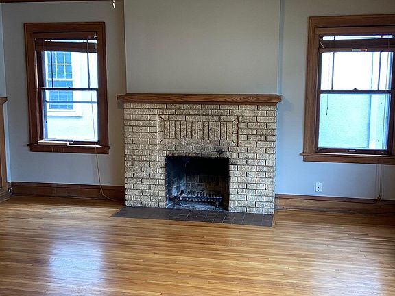 Spacious living room, decorative fireplace