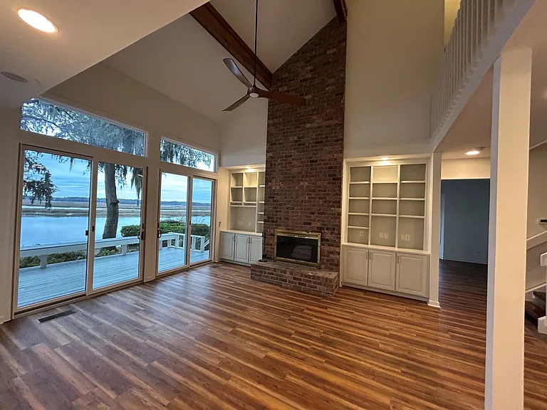 Living room with wood burning fire place