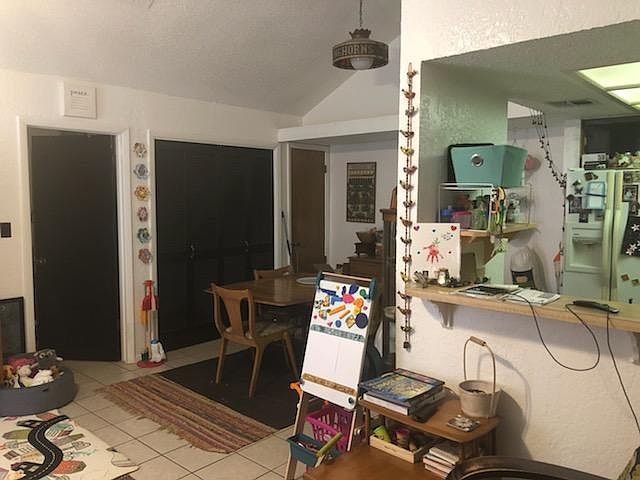 View when you walk in the front door. Living room to the left, door to large bedroom, dining room w washer/dryer closet, and kitchen