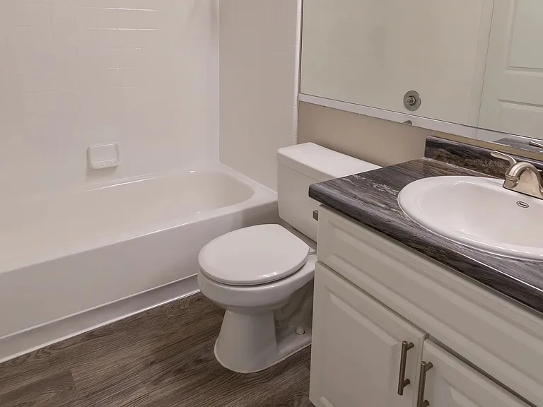 Elevate your daily routine with The View's tranquil bathroom oasisspacious and thoughtfully designed for an experience of harmonious comfort and style.